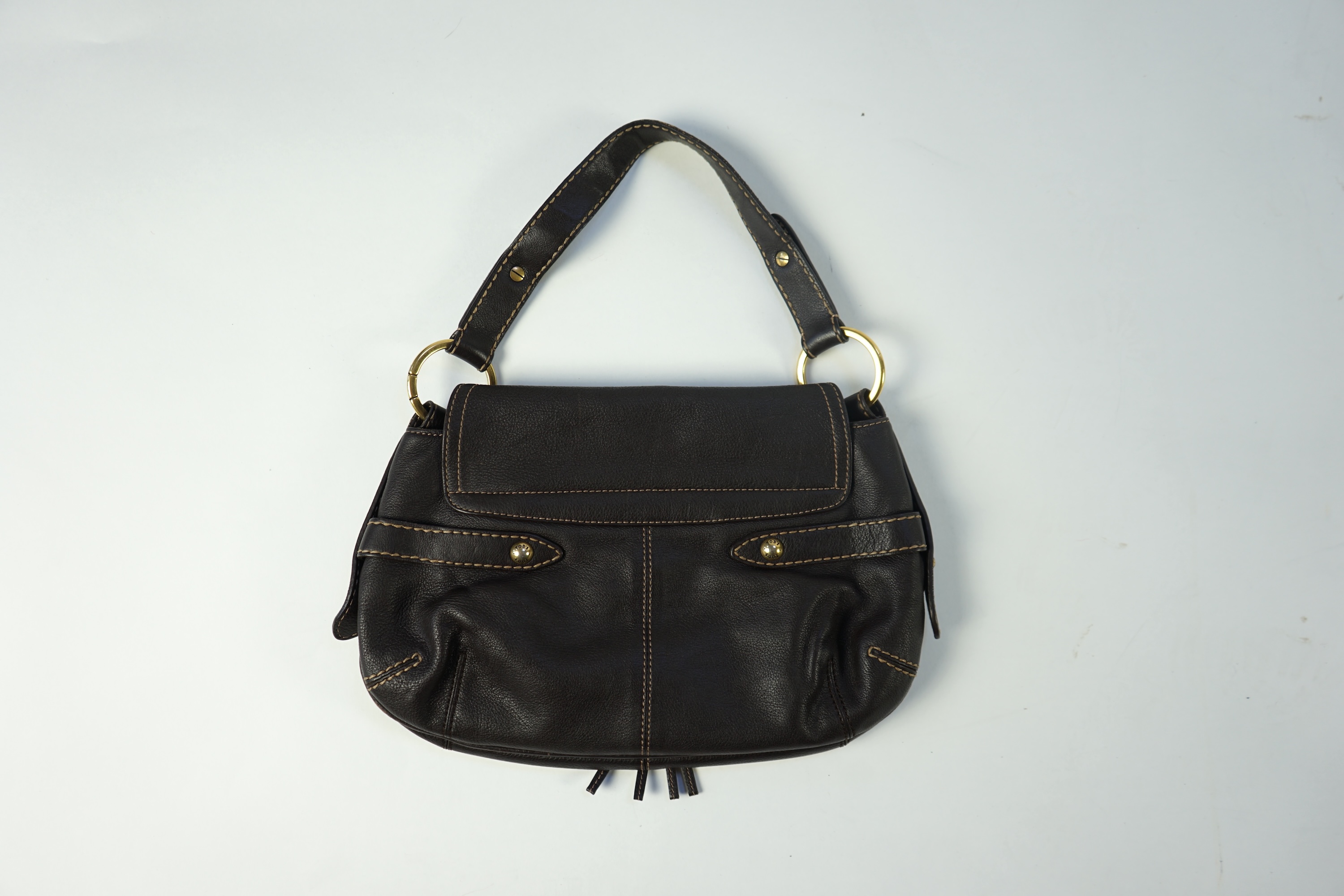 A brown leather Tod's shoulder bag with dust bag